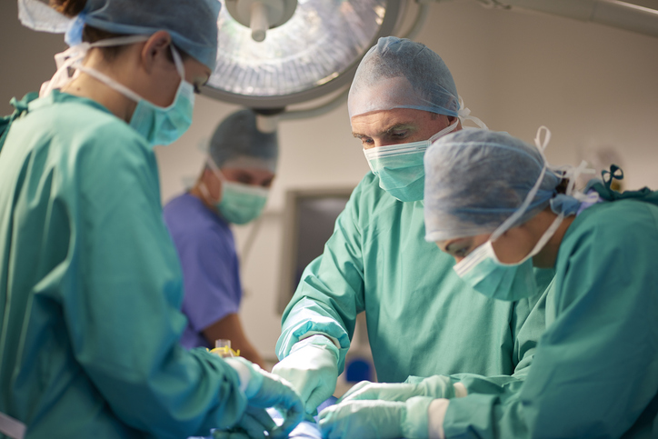 Surgical techs in operating room 