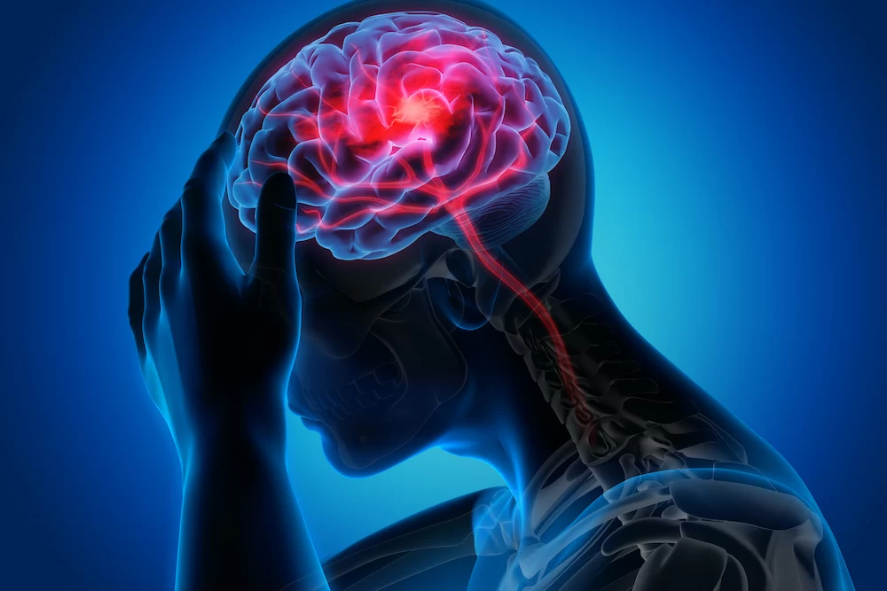 image of someone holding their head